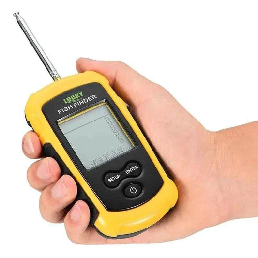 Hand holding Lucky FFW1108-1 fish finder with LCD display showing simple controls.