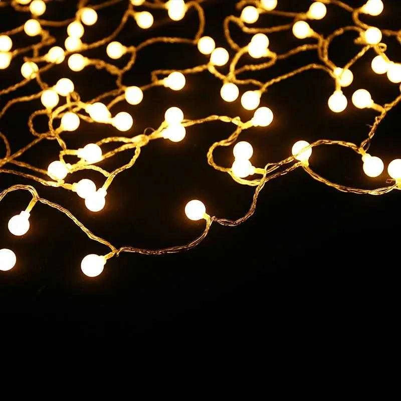 BLACKDEER Solar String Lights LED with warm glowing globes against a dark background.