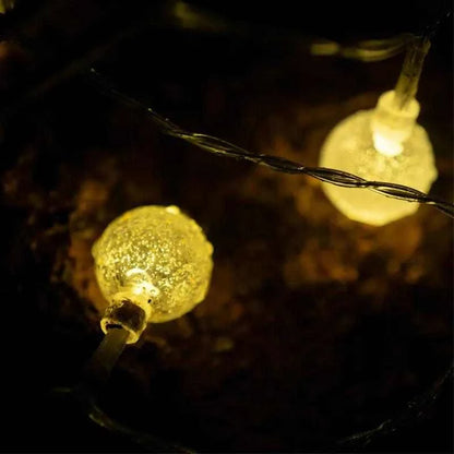 BLACKDEER Solar String Lights Led glowing at night, creating a soft, magical ambiance.