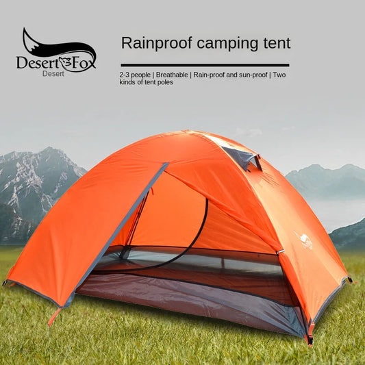 Orange rainproof camping tent with mountains in the background, featuring Desert Fox branding.