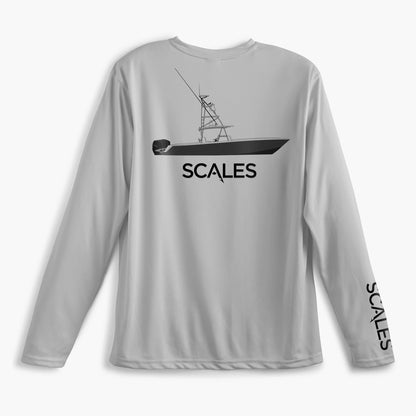 A light gray long-sleeve performance shirt with a black boat graphic and the word 'SCALES' across the chest, plus 'SCALES' printed down one sleeve, shown on a light gray background.