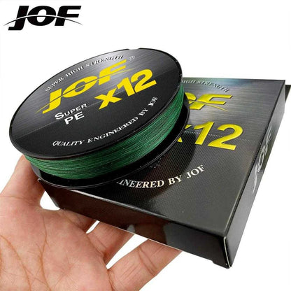 JOF X12 Braided 300m Super Strong Multifilament Fishing Line spool in hand, packaging box behind.