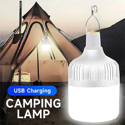 QIUCI USB LED Rechargeable Lantern hanging in a campsite, displaying bright illumination and USB charging feature.