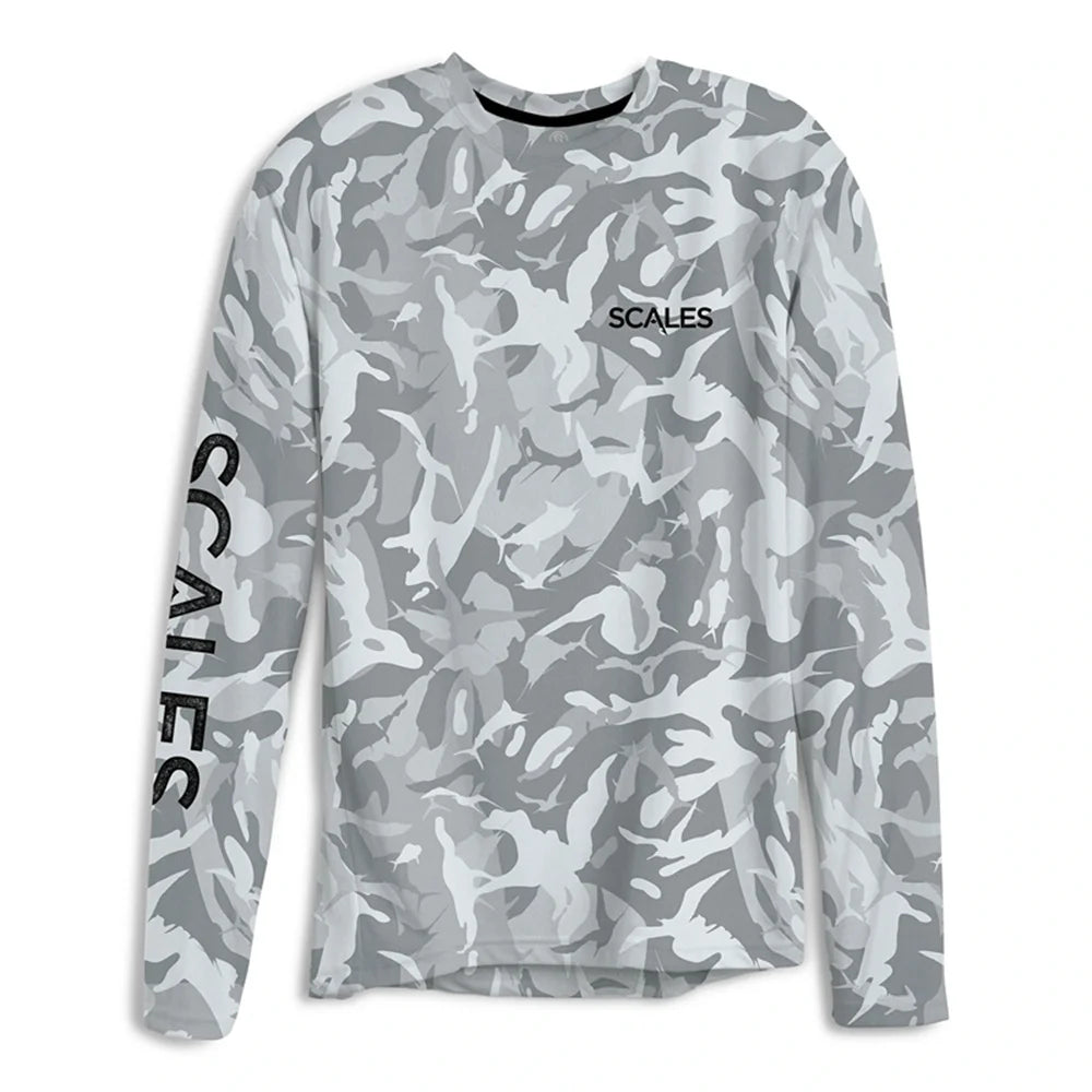 A long-sleeve crewneck shirt in a gray and white camouflage pattern, featuring the brand name 'SCALES' printed in black on the left chest and vertically down the right sleeve.