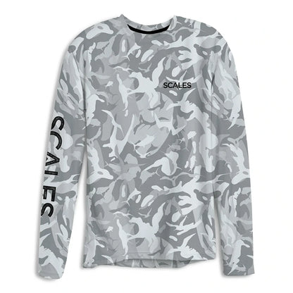 A long-sleeve crewneck shirt in a gray and white camouflage pattern, featuring the brand name 'SCALES' printed in black on the left chest and vertically down the right sleeve.